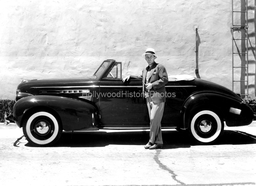 Bing Crosby 1939 Paramount sound stage with his  Oldsmobile wm.jpg